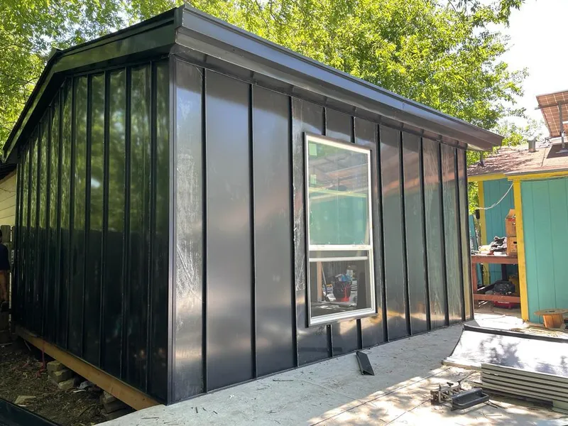 Black standing seam metal wall panels for Metal Roof Installation in Templeton